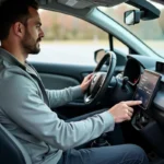 Conducteur appuyant sur le bouton de désactivation du mode éco dans l'habitacle d'une Citroën C3